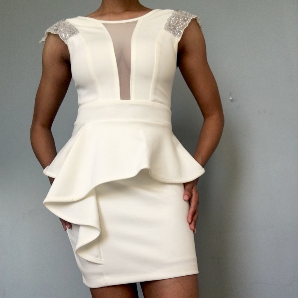 Form-fitted White Peplum Mini Dress